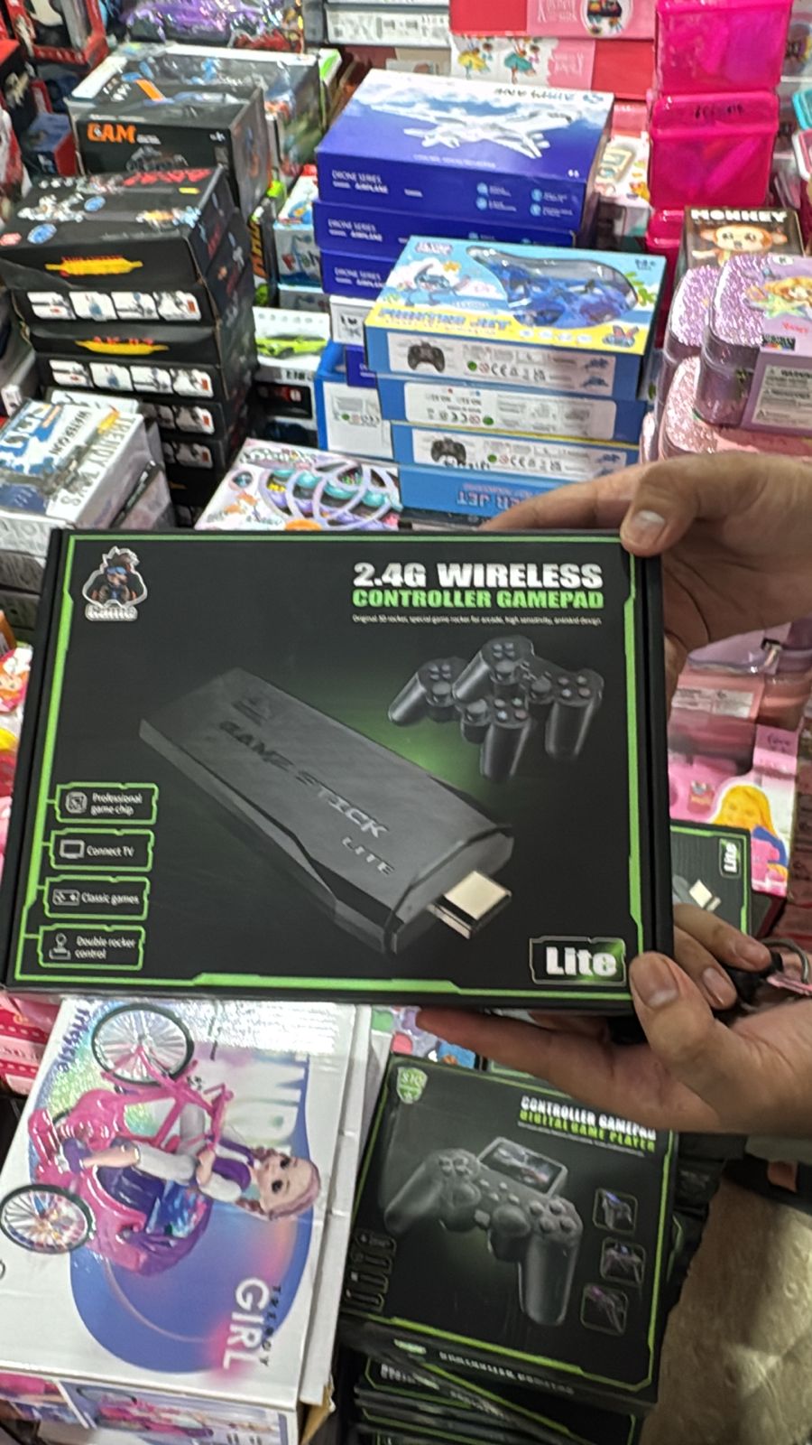 Game Stick Lite 2.4G Wireless HDMI Gaming Console with 2 Controllers - KidsMall Pakistan