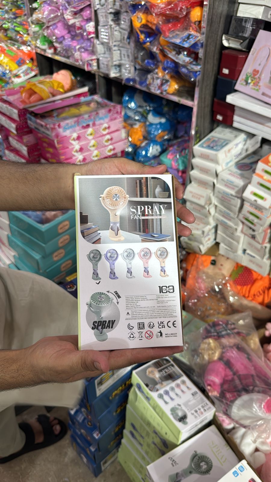 Cool Spray Fan back showing multiple colors and features